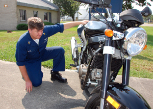 Inspecting Motorcycle